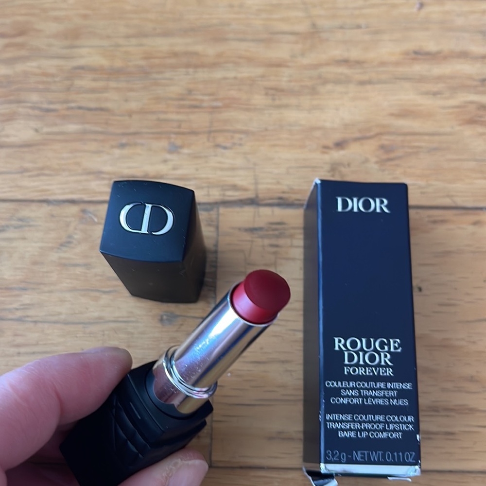 Dior lipstick # 879. New. A little dent on the top by opening.